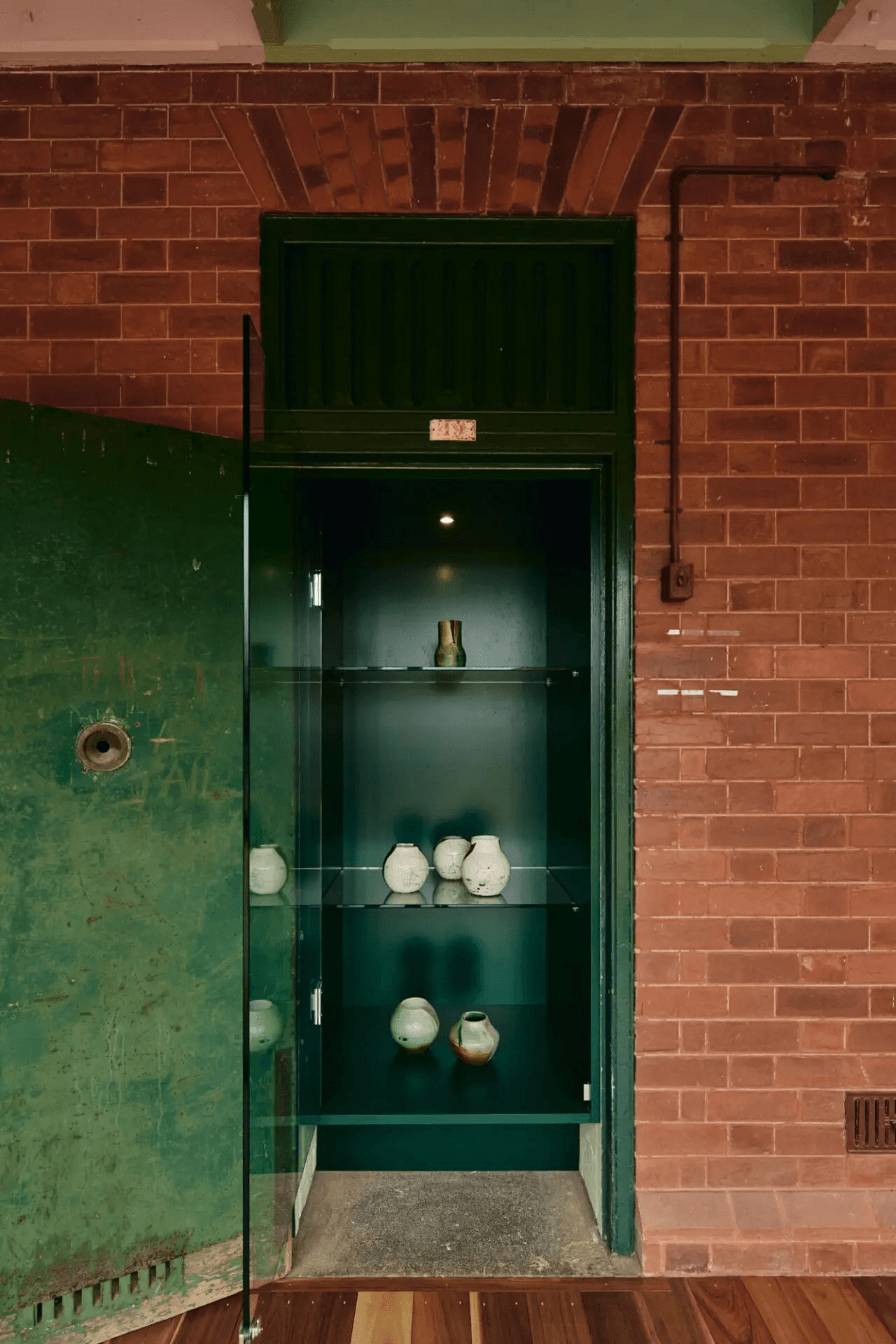 Old cell adapted into display cupboard